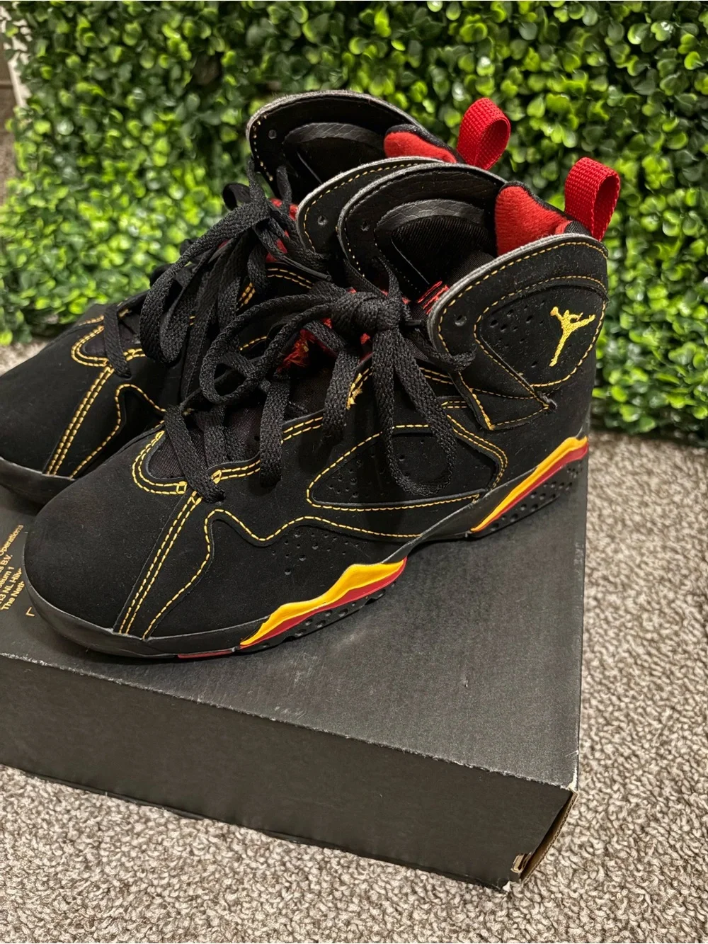 Jordan Kids Black Sneakers with Yellow & Red Accents